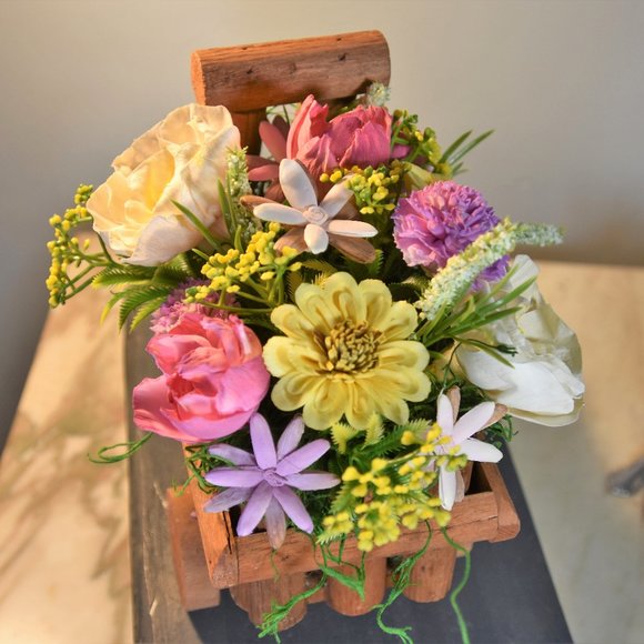 Cheerful garden arrangement of airbrushed Sola wood flowers in a garden cart - Picture 10 of 15